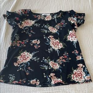 3/20$ Ricki's Black Floral Blouse